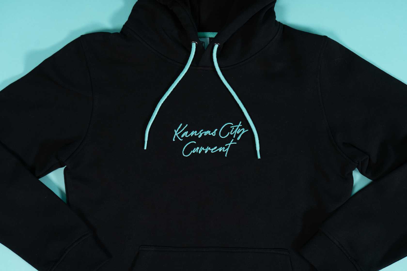 Unisex Black Teal Script Hoodie Front Zoomed In