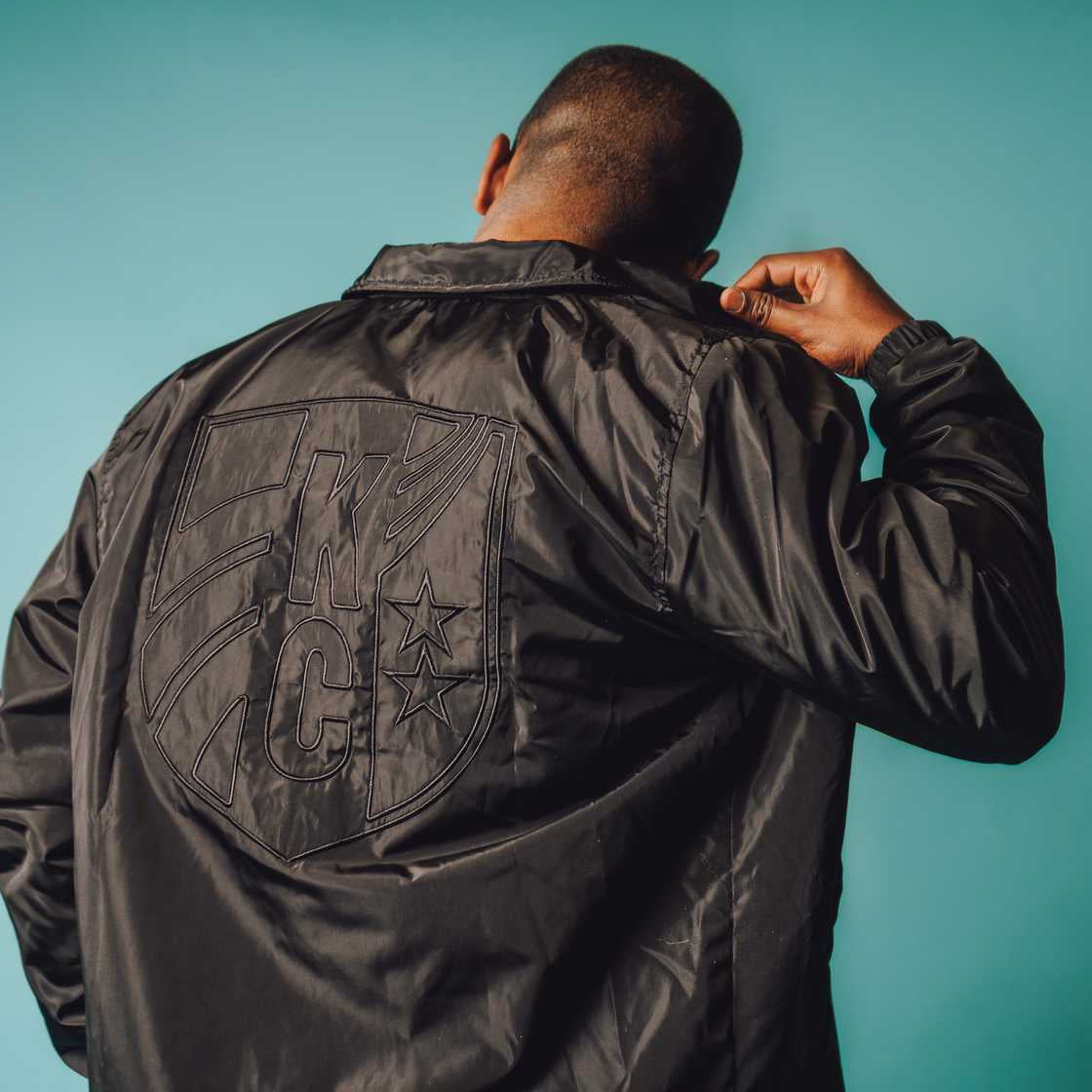 Unisex Black Tonal Coach Jacket Back on Model